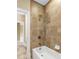 Simple bathroom with tiled shower and bathtub at 480 Lancashire Dr, Marietta, GA 30068