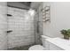 Updated bathroom featuring a walk-in shower with marble tile at 3648 Peachtree Ne Rd # 1A, Atlanta, GA 30319