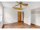 Bedroom includes hardwood floors, a ceiling fan and closet at 3664 Broadview Ct, Decatur, GA 30032