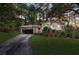 Front view of house with driveway and yard at 3664 Broadview Ct, Decatur, GA 30032
