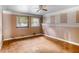 Simple bedroom with hardwood floors and ceiling fan at 3664 Broadview Ct, Decatur, GA 30032