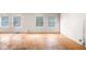 Spacious living room featuring hardwood floors and large windows at 3664 Broadview Ct, Decatur, GA 30032