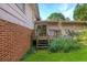 Back deck with wooden stairs and surrounding yard at 3664 Broadview Ct, Decatur, GA 30032