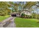 Ranch home with a two-car garage and a nicely landscaped yard at 3664 Broadview Ct, Decatur, GA 30032
