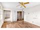 Bedroom features hardwood floors, a ceiling fan, and window at 3664 Broadview Ct, Decatur, GA 30032