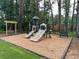 Community playground with swings and slides at 4085 Longleaf Ln, Tucker, GA 30084