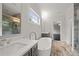 Bathroom with soaking tub and double vanity at 4085 Longleaf Ln, Tucker, GA 30084
