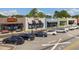 View of shops with cars parked in the lot at 4085 Longleaf Ln, Tucker, GA 30084