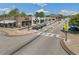 Aerial view of a vibrant street with shops and parked cars at 4085 Longleaf Ln, Tucker, GA 30084