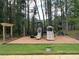 Community playground with playset and seating at 4085 Longleaf Ln, Tucker, GA 30084