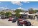 Aerial view of a street with shops and parking at 4085 Longleaf Ln, Tucker, GA 30084