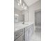 Bathroom with vanity, sink, and marble-tiled shower at 4085 Longleaf Ln, Tucker, GA 30084