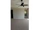 Large main bedroom with ceiling fan and access to the bathroom at 3036 Zodiac Ct, Lawrenceville, GA 30044