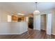 Dining room with hardwood floors and pantry access at 317 Shasta Ln, Mcdonough, GA 30253