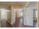 Bright hallway with doors to bedrooms and a bathroom at 317 Shasta Ln, Mcdonough, GA 30253