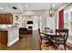 Bright dining area with a charming round table and access to the kitchen at 523 Black Horse Cir, Canton, GA 30114