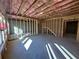 Unfinished basement with framing and insulation at 3301 Pepperpike Ct, Loganville, GA 30052