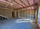 Unfinished basement with framing and insulation at 3301 Pepperpike Ct, Loganville, GA 30052