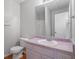 Bathroom with vanity, toilet and shower/tub combo at 705 Chase Ln, Mcdonough, GA 30253