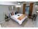 Cozy bedroom with a queen-size bed, neutral color palette, and ceiling fan at 2706 Suwanee Se Way # 12, Marietta, GA 30067