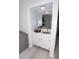 Built-in wet bar with white cabinetry and quartz countertops at 2706 Suwanee Se Way # 12, Marietta, GA 30067