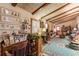 Living room with wood beams, vaulted ceiling, and a view of the fireplace at 2985 Duke Of Gloucester, Atlanta, GA 30344