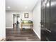 Bright entryway with dark hardwood floors at 2221 Baker Carter Dr, Loganville, GA 30052