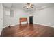 Spacious basement bedroom with hardwood floors and ample natural light at 2318 Starr Lake Nw Dr, Acworth, GA 30101