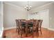 Dining room with hardwood floors, chandelier, and ample seating at 2318 Starr Lake Nw Dr, Acworth, GA 30101