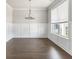 Spacious dining room with hardwood floors and elegant chandelier at 6055 Spring Way, Stonecrest, GA 30038