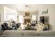 Open living room with hardwood floors and a brick fireplace at 500 Chestnut Walk, Canton, GA 30114