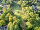 Aerial view of a golf course and neighborhood at 500 Chestnut Walk, Canton, GA 30114