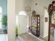 Bright entryway with hardwood floors and a large front door at 500 Chestnut Walk, Canton, GA 30114