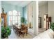 Formal dining room with a large table and hardwood floors at 500 Chestnut Walk, Canton, GA 30114