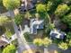 House nestled in a tree-lined neighborhood at 500 Chestnut Walk, Canton, GA 30114