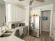 Modern kitchen with stainless steel appliances and white cabinets at 500 Chestnut Walk, Canton, GA 30114