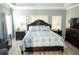 Main bedroom with king bed and walk-in closet at 500 Chestnut Walk, Canton, GA 30114