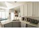 Spacious kitchen featuring a large island and breakfast bar at 500 Chestnut Walk, Canton, GA 30114
