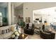 Comfortable living room with hardwood floors and views to the kitchen at 500 Chestnut Walk, Canton, GA 30114