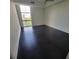 Spacious bedroom with large window and dark tile floors at 375 Ralph Mcgill Blvd # 505, Atlanta, GA 30312