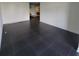 Large living room with dark tile floors at 375 Ralph Mcgill Blvd # 505, Atlanta, GA 30312