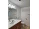 Bathroom with vanity, toilet and updated fixtures at 835 Amelia Grove Ln, Lawrenceville, GA 30045