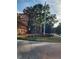 Amelia Grove community entrance with landscaping at 835 Amelia Grove Ln, Lawrenceville, GA 30045