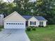 Ranch style house with a two-car garage at 835 Amelia Grove Ln, Lawrenceville, GA 30045