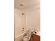 Clean bathroom with a tub, shower, and toilet at 835 Amelia Grove Ln, Lawrenceville, GA 30045