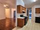 Open concept living room and kitchen with hardwood floors at 835 Amelia Grove Ln, Lawrenceville, GA 30045