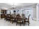 Formal dining room with a large table and access to kitchen and Gathering room at 2770 Pebble Hill Trce, Duluth, GA 30097