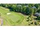 Golf course green with sand trap, homes nearby at 2770 Pebble Hill Trce, Duluth, GA 30097