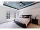 Primary bedroom with dark wood furniture and a ceiling fan at 2770 Pebble Hill Trce, Duluth, GA 30097