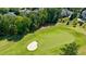 Golf course green with sand trap, homes nearby at 2770 Pebble Hill Trce, Duluth, GA 30097